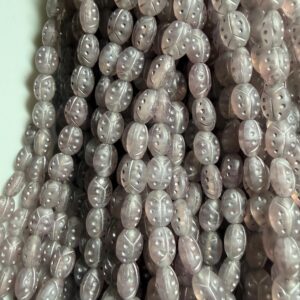 Czech glass strand of beads, 25 beads on strand. Grey  with gold ladybug motif 8mm x 6 mm