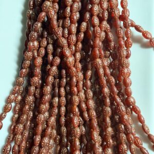 Alternative view of Czech Glass 25 Beads rust/gold oval ladybug design 8mm x 6mm